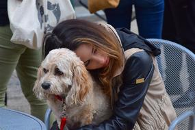 Woman Dog Hugs