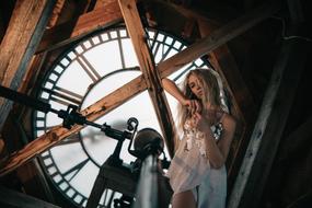 girl on the background of the clock