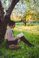 reading book girl at Grass Nature Outdoors