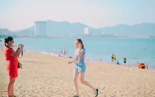 girls are photographed on the beach