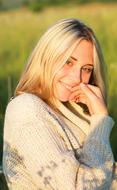 young blonde posing in nature