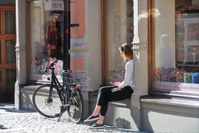Woman and Bike on Stockholm street