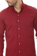 Bearded man in red shirt, at white background