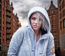 hooded woman in city