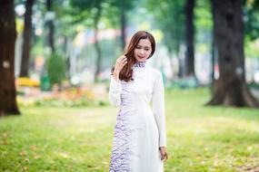 girl in white in the forest