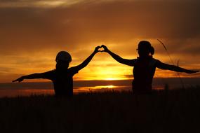 Love Family Heart at sunset
