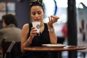 Young Woman drinking Coffee