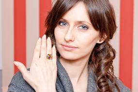 photo of a girl with jewelry on her finger