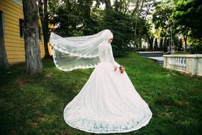 Girl dressed in wedding dress