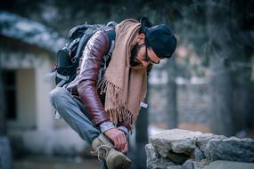 stylish young man in winter clothing