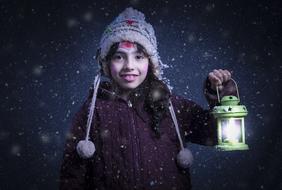 young girl at snowy weather