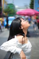 Outdoors asian Woman