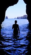 Silhouette Alone Woman in cave