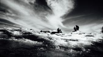 Women Swimming Ocean