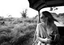 black and white, free girl travels in a jeep