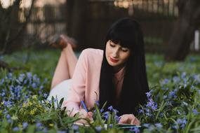 woman Model on Flowers and Grass