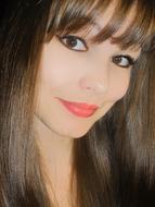 photo portrait of a brunette with bangs