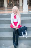 Beautiful anime girl, with the bag, sitting on the stairs