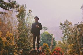 man in the foggy forest