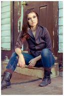attractive woman sitting on stairs