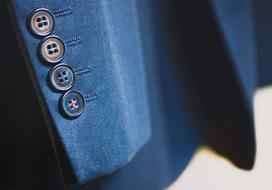 buttons on a blue men's jacket
