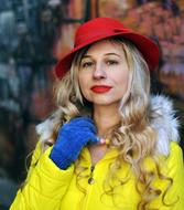 young woman in winter clothe and Red Retro Hat