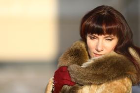 woman in fur coat in winter