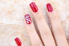 red manicure with a pattern