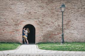 hugging couple in summertime