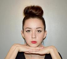 portrait of a woman with bun