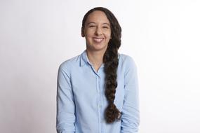 smiling young woman with braid