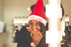 happy woman in Santa hat