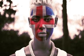 iceland flag, painting on face of young girl