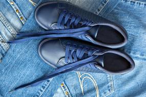 blue sneakers and jeans