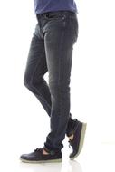Legs of a male in pants and shoes, at white background