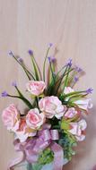 wedding bouquet with purple ribbon