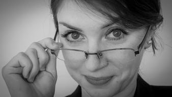 beautiful business woman with glasses close up