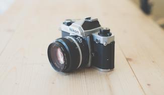 Vintage Photography Camera on wood