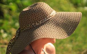 photo of a girl in a big straw hat