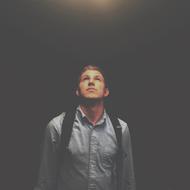 young man with backpack