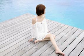 girl on pier in Relax Sea Hotel
