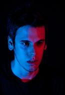 Portrait of the man with the colorful lights on it