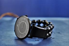 stylish black watch with beads
