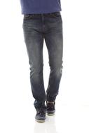 View of a person's jeans and shoes on the white surface
