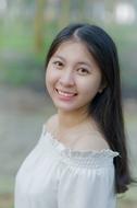 portrait of a beautiful brunette on a blurred background