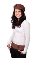 beautiful girl in a brown cap posing