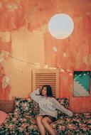 picture of a woman sitting on the couch