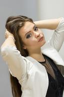 long haired Girl with hands at head