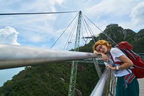 Girl Tourist bridge forest