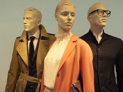 Mannequins in colorful clothing and with accessories